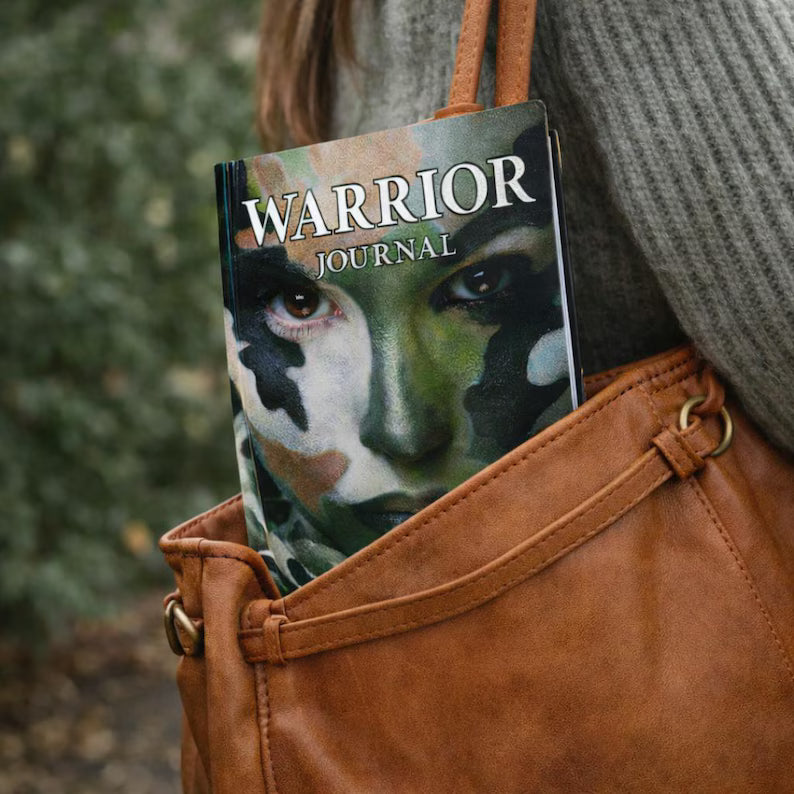 Warrior Journal paperback in purse showing portable 6x9 Christian prayer journal for everyday use